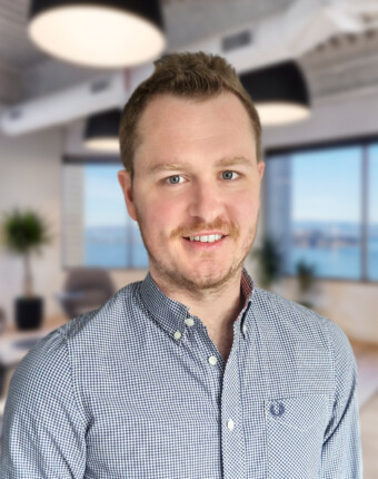 UK-tax-professional-standing-in-san-francisco-office