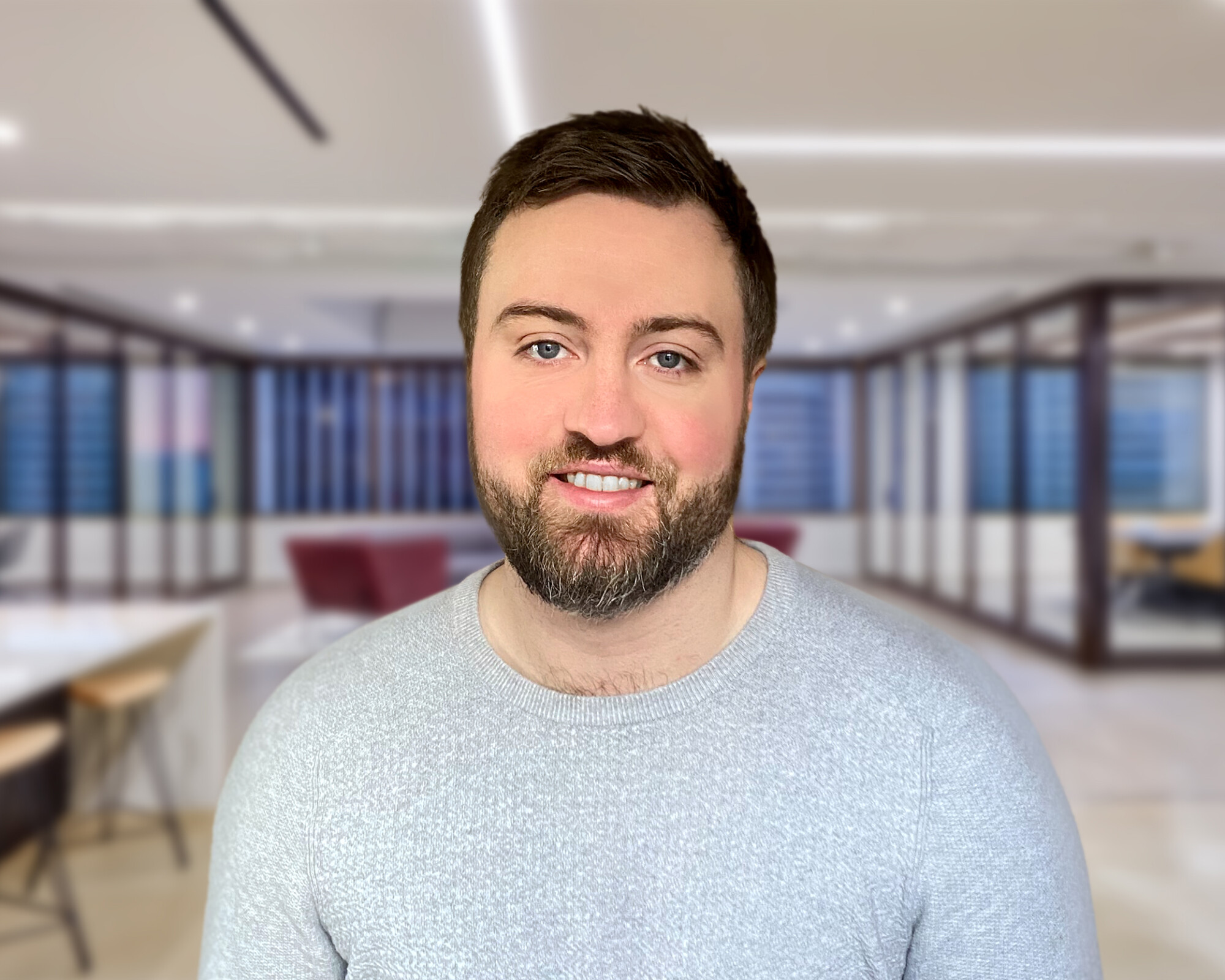 UK-audit-professional-standing-in-office